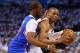 OKLAHOMA CITY, OK - MAY 13: (L-R) Chris Paul #3 of the Los Angeles Clippers defends Russell Westbrook #0 of the Oklahoma City Thunder in Game Five of the Western Conference Semifinals during the 2014 NBA Playoffs at Chesapeake Energy Arena on May 13, 201