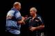 LONDON, ENGLAND - MAY 22: Raymond van Barneveld of the Netherlands shakes hands with Phil Taylor of England after the McCoys Premier League Darts Play-Offs Semi Final match between Raymond van Barneveld and Phil Taylor at O2 Arena on May 22, 2014 in Londo