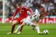 MADRID, SPAIN - APRIL 23: Toni Kroos of Bayern Muenchen challenges Luka Modric of Real Madrid during the UEFA Champions League semi-final first leg match between Real Madrid and FC Bayern Muenchen at the Estadio Santiago Bernabeu on April 23, 2014 in Mad