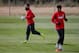 SEGOVIA, SPAIN - MAY 22: Diego Costa (R) of Atletico de Madrid excersises with his teammate Arda Turan (L) during a training session prior to UEFA Champions League Final between Club Atletico de Madrid and Real Madrid CF on May 22, 2014 at Los Angeles de