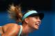 MELBOURNE, AUSTRALIA - JANUARY 18: Maria Sharapova of Russia serves in her third round match against Alize Cornet of France during day six of the 2014 Australian Open at Melbourne Park on January 18, 2014 in Melbourne, Australia. (Photo by Cameron Spenc