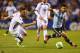 ST. LOUIS, MO - NOVEMBER 18: Sergio Aguero #10 of Argentina controls the ball against Ermin Bicakcic #3 of Bosnia-Herzegovina during the international friendly match between Bosnia-Herzegovina and Argentina at Busch Stadium on November 18, 2013 in St. Lou