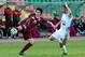 KAZAN, RUSSIA - MAY 04: Sardar Azmoun (L) of FC Rubin Kazan is challenged by Solvi Ottesen of FC Ural Sverdlovsk Oblast during the Russian Football League Championship match between FC Rubin Kazan and FC Ural Sverdlovsk Oblast at the Tsentraliniy Stadium