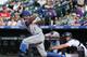 Young swinging at a pitch