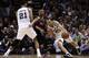 SAN ANTONIO, TX - MAY 8: Tim Duncan #21 of the San Antonio Spurs sets a pick against Damian Lillard #0 of the Portland Trail Blazers so teammate Manu Ginobili #20 can drive by in Game Two of the Western Conference Semifinals during the 2014 NBA Playoffs