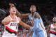 PORTLAND, OR - MARCH 1: Meyers Leonard #11 of the Portland Trail Blazers boxes out Quincy Miller #30 of the Denver Nuggets on March 1, 2014 at the Moda Center Arena in Portland, Oregon. NOTE TO USER: User expressly acknowledges and agrees that, by downlo