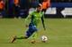 May 3, 2014; Seattle, WA, USA; Seattle Sounders FC defender DeAndre Yedlin (17) dribbles the ball during the game against the Philadelphia Union at CenturyLink Field. Seattle defeated Philadelphia 2-1. Mandatory Credit: Steven Bisig-USA TODAY Sports