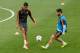 MADRID, SPAIN - MAY 20: Francisco Roman Alarcon alias Isco (R) of Real Madrid CF competes for the ball with his teammate Raphael Varane (L) during the training session held the Real Madrid media day, prior to UEFA Champions League final against Club Atlet