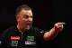 LONDON, ENGLAND - DECEMBER 18: James Richardson of Great Britain reacts during his first round match against Raymond van Barneveld of The Netherlands during day four of the 2012 Ladbrokes.com World Darts Championship at Alexandra Palace on December 18, 2