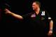LONDON, ENGLAND - DECEMBER 27: Kevin Painter of England in action during his third round match against Simon Whitlock of Australia on day twelve of the Ladbrokes.com World Darts Championship at Alexandra Palace on December 27, 2013 in London, England. (P
