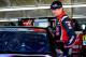 CHARLOTTE, NC - MAY 24: Kurt Busch, driver of the #41 Haas Automation Made in America Chevrolet, climbs into his car during practice for the NASCAR Sprint Cup Series Coca-Cola 600 at Charlotte Motor Speedway on May 24, 2014 in Charlotte, North Carolina.