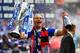 LONDON, ENGLAND - MAY 24: Match winning goalscorer Bobby Zamora of Queens Park Rangers celebrates with the winners trophy following his sides victory during the Sky Bet Championship Playoff Final between Derby County and Queens Park Rangers at Wembley St