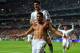 LISBON, PORTUGAL - MAY 24: Cristiano Ronaldo of Real Madrid celebrates with r21 after scoring their fourth goal from the penalty spot during the UEFA Champions League Final between Real Madrid and Atletico de Madrid at Estadio da Luz on May 24, 2014 in L