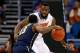 ORLANDO, FL - MARCH 22: Patric Young #4 of the Florida Gators plays defense on Josh Newkirk #13 of the Pittsburgh Panthers in the second half during the third round of the 2014 NCAA Men's Basketball Tournament at Amway Center on March 22, 2014 in Orlando