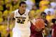 COLUMBIA, MO - JANUARY 25: Jabari Brown #32 of the Missouri Tigers controls the ball on a fast break as Justin McKie #20 of the South Carolina Gamecocks chases during the game at Mizzou Arena on January 25, 2014 in Columbia, Missouri. (Photo by Jamie Sq