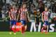 LISBON, PORTUGAL - MAY 24: Dejected Adrian Lopez and Gabi of Club Atletico de Madrid look on after conceding a late goal in stoppage time during the UEFA Champions League Final between Real Madrid and Atletico de Madrid at Estadio da Luz on May 24, 2014