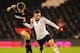 LONDON, ENGLAND - APRIL 07: Patrick Roberts of Fulham U18 and Harry Cardwell of Reading U18 chase the ball during the FA Youth Cup Semi Final second leg match at Craven Cottage on April 7, 2014 in London, England. (Photo by Tom Dulat/Getty Images)