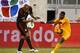 EAST RUTHERFORD, NJ - AUGUST 14: Serge Aurier #17 of Ivory Coast kicks the ball into Carlos Salcido #3 of Mexico during their match at MetLife Stadium on August 14, 2013 in East Rutherford, New Jersey. (Photo by Jeff Zelevansky/Getty Images)