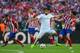 LISBON, PORTUGAL - MAY 24: Sami Khedira of Real Madrid and Tiago of Club Atletico de Madrid battle for the ball uring the UEFA Champions League Final between Real Madrid and Atletico de Madrid at Estadio da Luz on May 24, 2014 in Lisbon, Portugal. (Phot