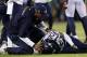 EAST RUTHERFORD, NJ - FEBRUARY 02: Cornerback Richard Sherman #25 of the Seattle Seahawks recieves medical attention after an injury during Super Bowl XLVIII against the Denver Broncos at MetLife Stadium on February 2, 2014 in East Rutherford, New Jersey