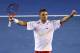 MELBOURNE, AUSTRALIA - JANUARY 26: Stanislas Wawrinka of Switzerland celebrates winning championship point in his men's final match against Rafael Nadal of Spain during day 14 of the 2014 Australian Open at Melbourne Park on January 26, 2014 in Melbourne