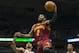 Apr 11, 2014; Milwaukee, WI, USA; Cleveland Cavaliers guard Kyrie Irving (2) drives for a shot during the first quarter against the Milwaukee Bucks at BMO Harris Bradley Center. Mandatory Credit: Jeff Hanisch-USA TODAY Sports