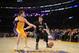 LOS ANGELES, CA - DECEMBER 20: Kevin Love #42 of the Minnesota Timberwolves drives against Pau Gasol #16 of the Los Angeles Lakers at Staples Center on December 20, 2013 in Los Angeles, California. NOTE TO USER: User expressly acknowledges and agrees that