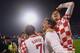 ZAGREB, CROATIA - NOVEMBER 19: Ivan Rakitic, Mario Mandzukic and Luka Modric (L-R) of Croatia celebrate after the FIFA 2014 World Cup Qualifier play-off second leg match between Croatia and Iceland at Maksimir Stadium on November 19, 2013 in Zagreb, Croa