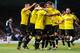 SOUTHEND, ENGLAND - MAY 17: Marcus Holness of Burton Albion celebrates scoring the 1st goal with team-mates during the Sky Bet League 2 Play Off Semi Final second leg match between Southend United and Burton Albion at Roots Hall on May 17, 2014 in Southe