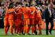 AMSTERDAM, NETHERLANDS - OCTOBER 11: Holland manager Louis van Gaal celebrates with his team during the FIFA 2014 World Cup Qualifing match between Holland and Hungary at Amsterdam Arena on October 11, 2013 in Amsterdam, Netherlands. (Photo by Scott Hea