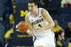 ANN ARBOR, MI - DECEMBER 07: Mitch McGary #4 of the University of Michigan Wolverines drives the ball up the court during the second half of the game against Houston Baptist Huskies at the Crisler Center on December 7, 2013 in Ann Arbor, Michigan. Michig