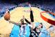 OKLAHOMA CITY, OK MAY 25: Reggie Jackson #15 of the Oklahoma City Thunder shoots against Tiago Splitter #22 of the San Antonio Spurs in Game Three of the Western Conference Finals during the 2014 NBA Playoffs on May 25, 2014 at the Chesapeake Energy Aren