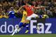 TORONTO, ON - NOVEMBER 19: Alexis Sanchez #7 of Chile battles for a ball with David Luiz #4 of Brazil during a friendly match at Rogers Centre on November 19, 2013 in Toronto, Canada. (Photo by Dave Sandford/Getty Images)