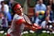 PARIS, FRANCE - MAY 25: Roger Federer of Switzerland returns a shot during his men's singles match against Lukas Lacko of Slovakia on day one of the French Open at Roland Garros on May 25, 2014 in Paris, France. (Photo by Matthias Hangst/Getty Images)