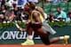 PARIS, FRANCE - MAY 25: Serena Williams of the United States reacts during her women's singles match against Alize Lim of France on day one of the French Open at Roland Garros on May 25, 2014 in Paris, France. (Photo by Matthias Hangst/Getty Images)