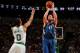 BOSTON, MA - DECEMBER 16: Kevin Love #42 of the Minnesota Timberwolves shoots the ball against Avery Bradley #0 of the Boston Celtics on December 16, 2013 at the TD Garden in Boston, Massachusetts. NOTE TO USER: User expressly acknowledges and agrees tha