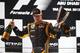 ABU DHABI, UNITED ARAB EMIRATES - NOVEMBER 04: Kimi Raikkonen of Finland and Lotus celebrates on the podium after winning the Abu Dhabi Formula One Grand Prix at the Yas Marina Circuit on November 4, 2012 in Abu Dhabi, United Arab Emirates. (Photo by Ma