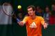 PARIS, FRANCE - MAY 24: Andy Murray of Great Britain plays a shot during a practice session ahead of the French Open at Roland Garros on May 24, 2014 in Paris, France. (Photo by Dan Istitene/Getty Images)