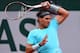 PARIS, FRANCE - MAY 26: Rafael Nadal of Spain returns a shot during his men's singles match against Robby Ginepri of the United States on day two of the French Open at Roland Garros on May 26, 2014 in Paris, France. (Photo by Matthias Hangst/Getty Image