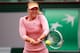 PARIS, FRANCE - MAY 26: Maria Sharapova of Russia returns a shot during her women's singles match against Ksenia Pervak of Russia on day two of the French Open at Roland Garros on May 26, 2014 in Paris, France. (Photo by Clive Brunskill/Getty Images)