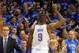 May 25, 2014; Oklahoma City, OK, USA; Oklahoma City Thunder head coach Scott Brooks slaps hands with forward Serge Ibaka (9) as he leaves the court against the San Antonio Spurs during the fourth quarter in game three of the Western Conference Finals of t