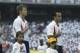 WASHINGTON - AUGUST 3: Forward Brian McBride #20, forward Landon Donovan #21 and defender Alexi Lalas #22 of the US National Team stand for the National Anthem before the MLS All Star match against the MLS All Star Team on August 3, 2002 at RFK Stadium i