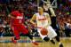 BUFFALO, NY - MARCH 22: Tyler Ennis #11 of the Syracuse Orange drives to the basket as Khari Price #0 of the Dayton Flyers defends during the third round of the 2014 NCAA Men's Basketball Tournament at the First Niagara Center on March 22, 2014 in Buffalo