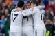 MADRID, SPAIN - NOVEMBER 09: Karim Benzema (2ndL) celebrates scoring their second goal with teammates Cristiano Ronaldo (2ndR), Gareth Bale (R) and Alvaro Arbeloa (L) during the La Liga match between Real Madrid CF and Real Sociedad de Futbol at Estadio
