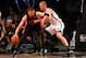 Apr 25, 2014; Brooklyn, NY, USA; Brooklyn Nets forward Mason Plumlee (1) defends Toronto Raptors center Jonas Valanciunas (17) during the third quarter in game three of the first round of the 2014 NBA Playoffs at Barclays Center. Brooklyn Nets won 102-98.