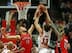 CHICAGO, IL - DECEMBER 14: Jonas Valanciunas #17 of the Toronto Raptors blocks a shot by Joakim Noah #13 of the Chicago Bulls as Amir Johnson #15 defends at the United Center on December 14, 2013 in Chicago, Illinois. NOTE TO USER: User expressly acknowl