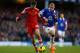 LIVERPOOL, ENGLAND - DECEMBER 29: Adam Lallana of Southampton competes with Ross Barkley of Everton during the Barclays Premier League match between Everton and Southampton at Goodison Park on December 29, 2013 in Liverpool, England. (Photo by Paul Thom