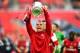 LONDON, ENGLAND - MAY 17: Lukas Podolski of Arsenal celebrates victory with the trophy after the FA Cup with Budweiser Final match between Arsenal and Hull City at Wembley Stadium on May 17, 2014 in London, England. (Photo by Shaun Botterill/Getty Image
