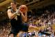 DURHAM, NC - DECEMBER 03: Mitch McGary #4 of the Michigan Wolverines pulls down a rebound against the Duke Blue Devils at Cameron Indoor Stadium on December 3, 2013 in Durham, North Carolina. Duke won 79-69. (Photo by Grant Halverson/Getty Images)