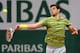PARIS, FRANCE - MAY 27: Grigor Dimitrov of Bulgaria returns a shot during his men's singles match against Ivo Karlovic of Croatia on day three of the French Open at Roland Garros on May 27, 2014 in Paris, France. (Photo by Matthew Stockman/Getty Images)